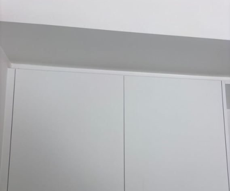 Inspection photograph illustrating cabinet door operation